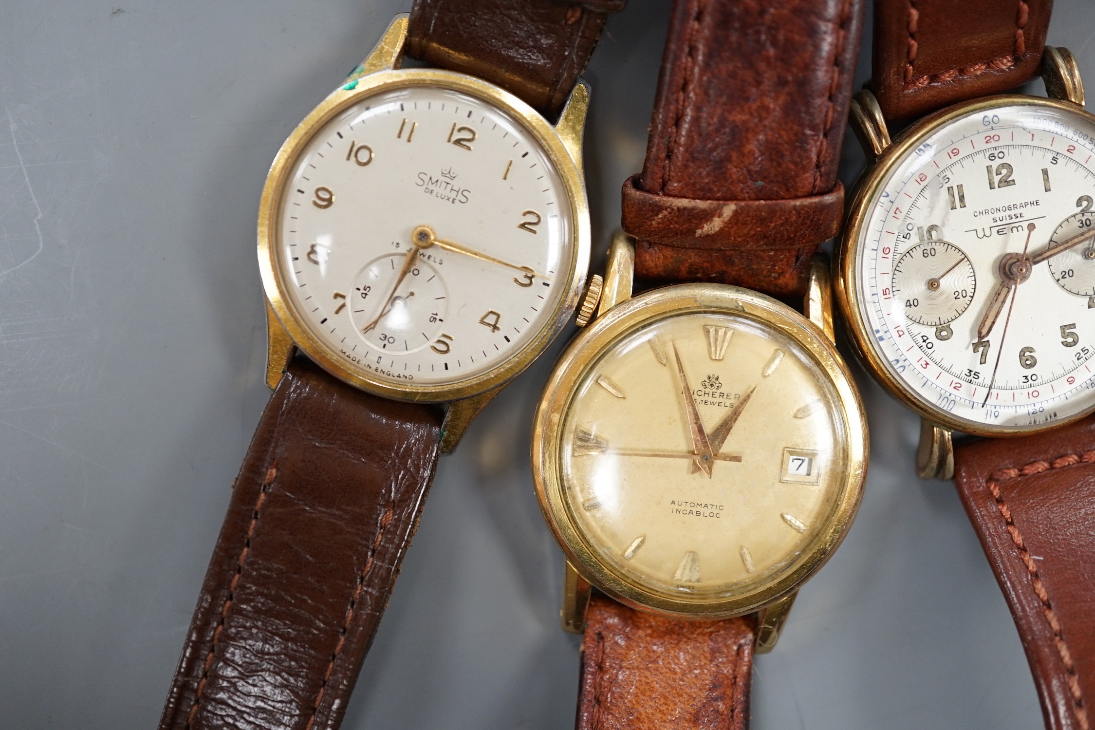 Five gentleman's assorted 1950's and later steel or steel and gold plated wrist watches including Smiths and Bucherer and a lady's 9ct gold wrist watch.